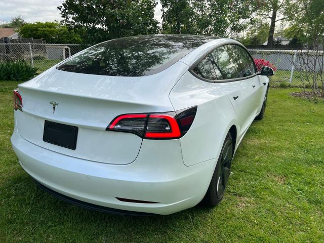 Photo 4 from auction – 2021 TESLA MODEL 3 with VIN 5YJ3E1EA2MF854985