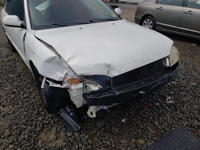 Photo 9 from auction – 2003 KIA SPECTRA BA with VIN KNAFB121135213706