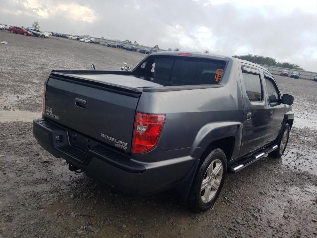 Photo 9 from auction – 2010 HONDA RIDGELINE with VIN 5FPYK1F54AB005315