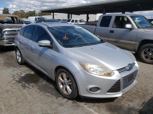 FORD FOCUS SE 2014 with VIN 1FADP3K23EL211685 - Photo from auction