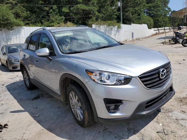 MAZDA CX-5 TOURI 2016 with VIN JM3KE2CY4G0917984 - Photo from auction