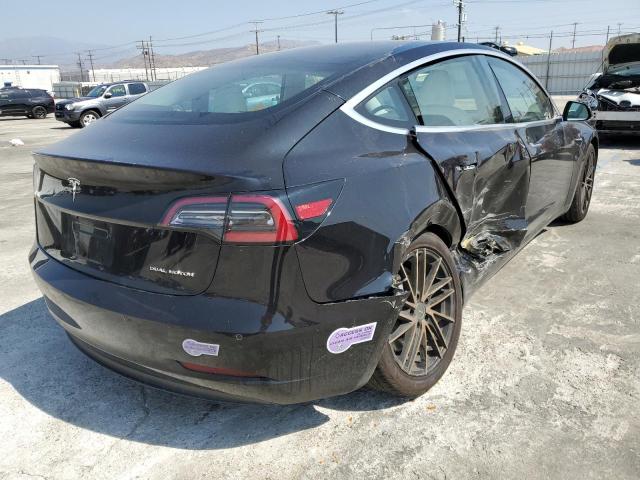 Photo 4 from auction – 2018 TESLA MODEL 3 with VIN 5YJ3E1EBXJF096009