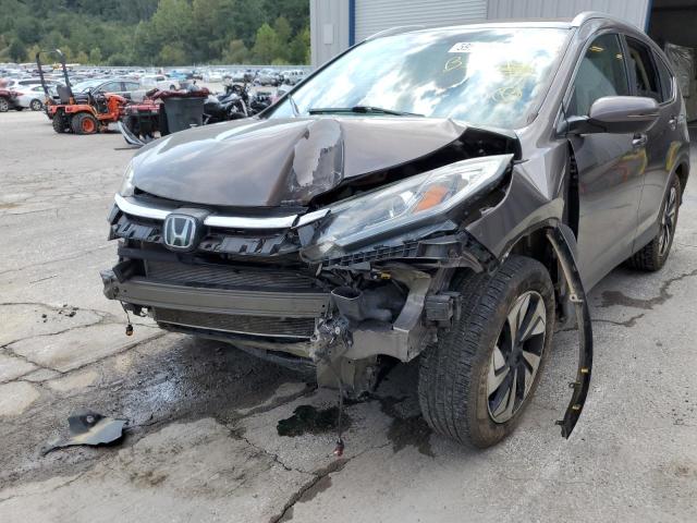 Photo 9 from auction – 2016 HONDA CR-V TOURI with VIN 5J6RM4H90GL065133