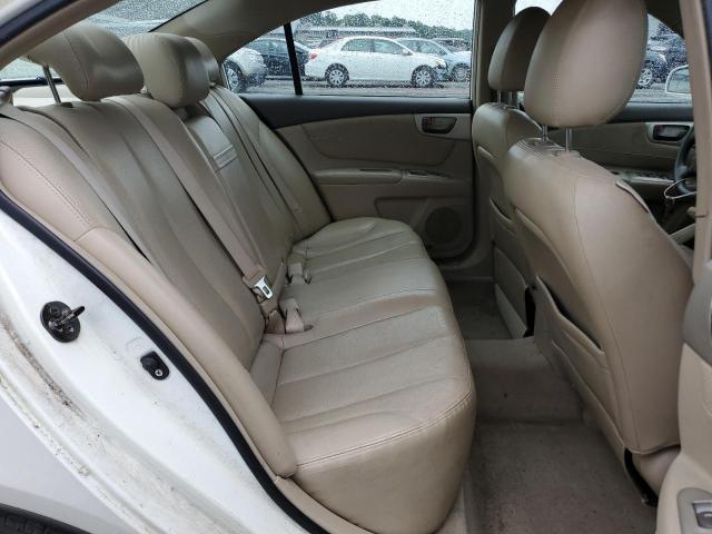 Photo 6 from auction – 2006 KIA OPTIMA LX with VIN KNAGE124765048559
