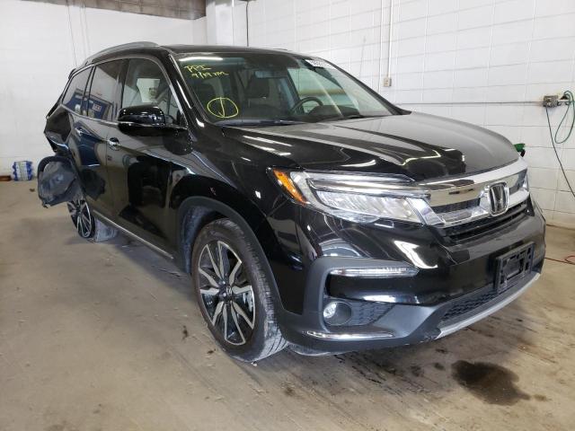 HONDA PILOT TOUR 2021 with VIN 5FNYF6H96MB054885 - Photo from auction