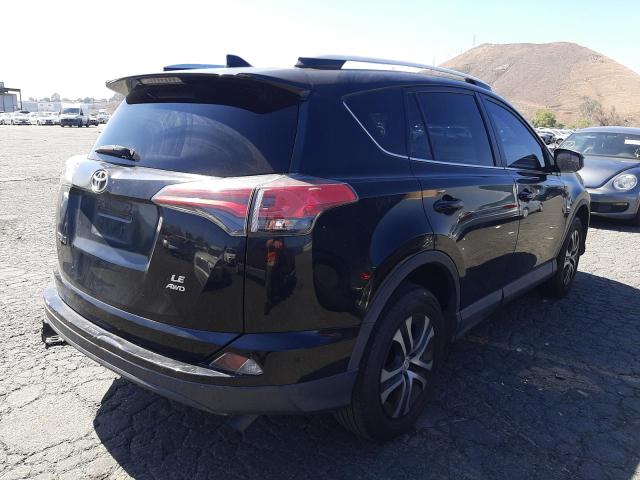 Photo 4 from auction – 2016 TOYOTA RAV4 LE with VIN 2T3BFREV3GW521431