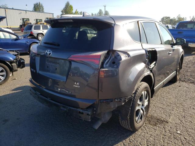 Photo 4 from auction – 2018 TOYOTA RAV4 LE with VIN JTMBFREV9JJ201472