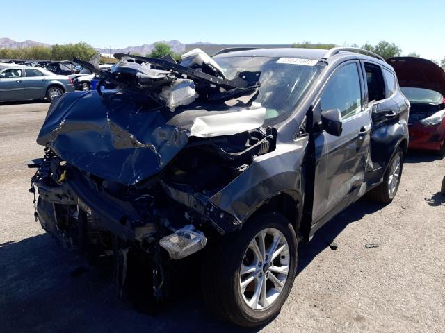 Photo 2 from auction – 2018 FORD ESCAPE SE with VIN 1FMCU9GD8JUC19129