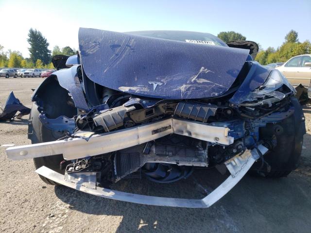 Photo 9 from auction – 2022 TESLA MODEL 3 with VIN 5YJ3E1EB6NF186120