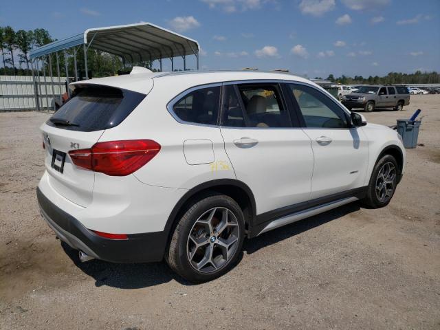 Photo 4 from auction – 2018 BMW X1 XDRIVE2 with VIN WBXHT3C30J5F93239