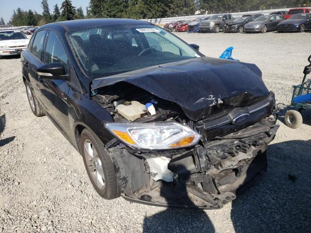 FORD FOCUS SE 2014 with VIN 1FADP3F2XEL390897 - Photo from auction