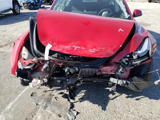 Photo 9 from auction – 2022 TESLA MODEL 3 with VIN 5YJ3E1EA9NF304801