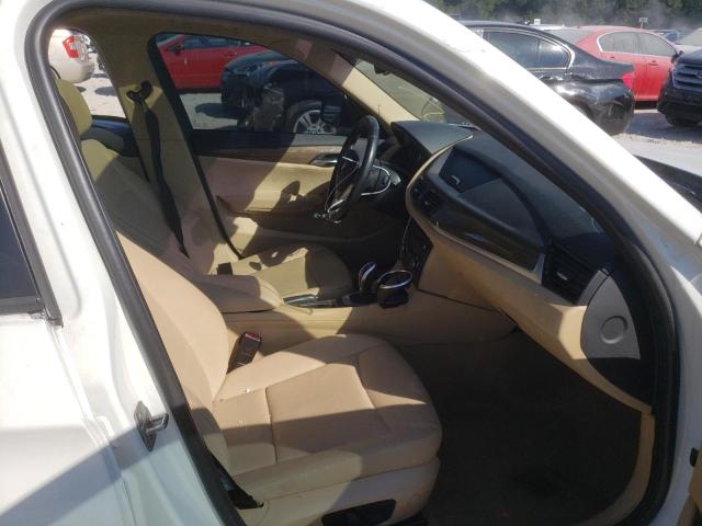 Photo 5 from auction – 2015 BMW X1 SDRIVE2 with VIN WBAVM1C54FVW57027