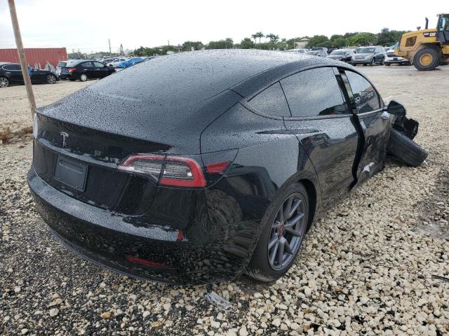 Photo 4 from auction – 2022 TESLA MODEL 3 with VIN 5YJ3E1EA6NF317652
