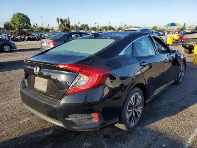 Photo 4 from auction – 2017 HONDA CIVIC EXL with VIN 2HGFC1F72HH643101