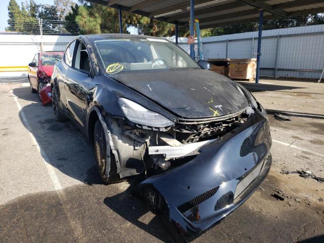 TESLA MODEL Y 2021 with VIN 5YJYGDEE6MF065503 - Photo from auction