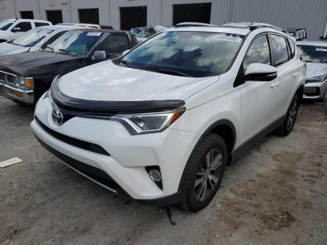 Photo 2 from auction – 2016 TOYOTA RAV4 XLE with VIN JTMWFREV6GJ090910