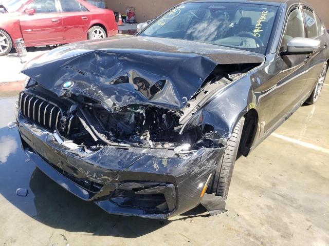 Photo 9 from auction – 2022 BMW M550XI with VIN WBA13BK06NCH62436