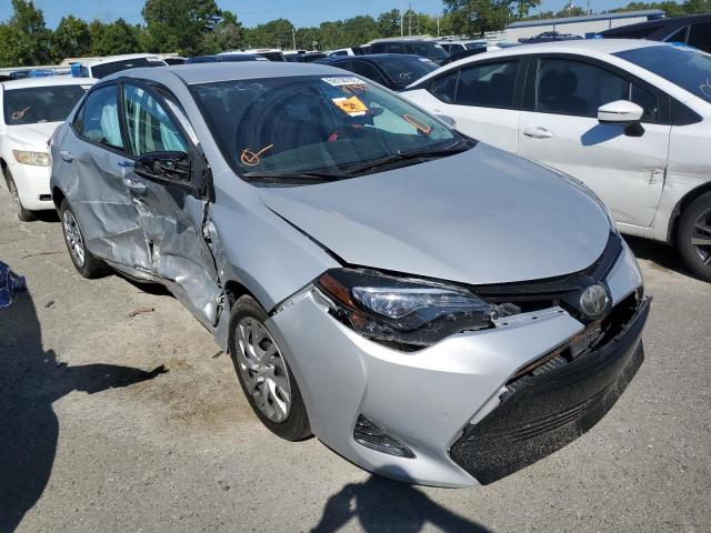 TOYOTA COROLLA L 2017 with VIN 5YFBURHE6HP677833 - Photo from auction