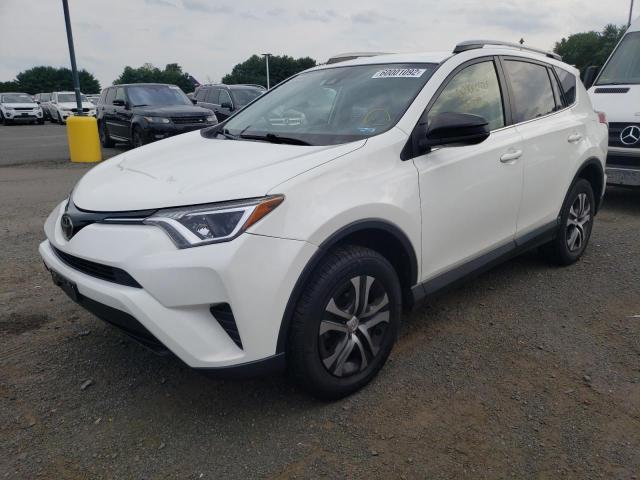 Photo 2 from auction – 2018 TOYOTA RAV4 LE with VIN JTMBFREV2JJ210787
