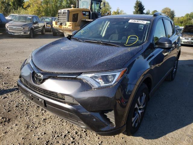 Photo 2 from auction – 2018 TOYOTA RAV4 LE with VIN JTMBFREV9JJ201472