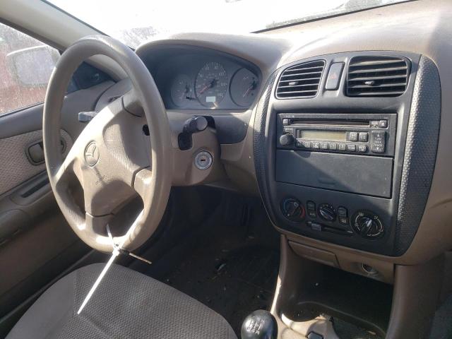 Photo 9 from auction – 1999 MAZDA PROTEGE DX with VIN JM1BJ2221X0102465