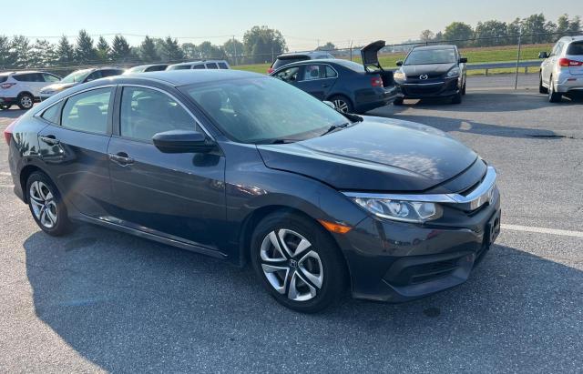 HONDA CIVIC LX 2017 with VIN 2HGFC2F5XHH572850 - Photo from auction