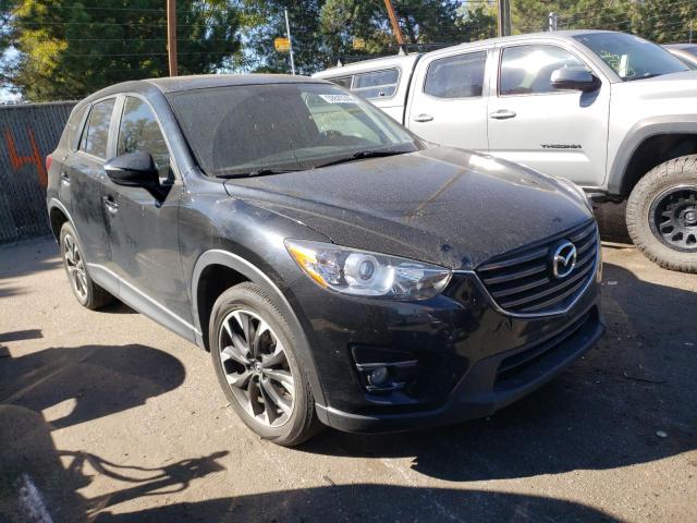 MAZDA CX-5 GT 2016 with VIN JM3KE4DY0G0885304 - Photo from auction