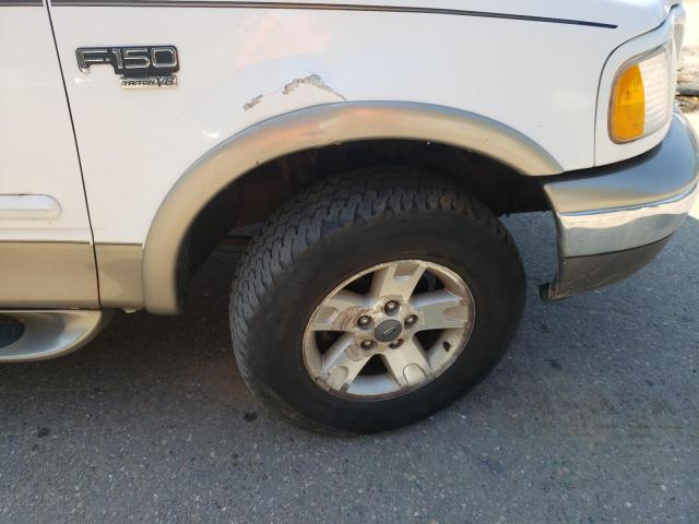 Photo 9 from auction – 2002 FORD F150 with VIN 1FTRX18L32NA24368