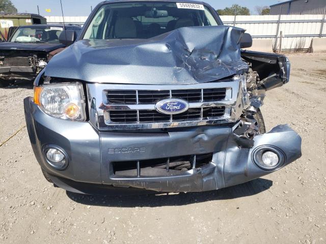 Photo 7 from auction – 2011 FORD ESCAPE 4D with VIN 1FMCU0DG4BKC70327