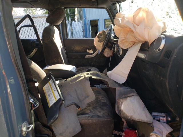 Photo 5 from auction – 2015 JEEP WRANGLER U with VIN 1C4BJWFG7FL732596
