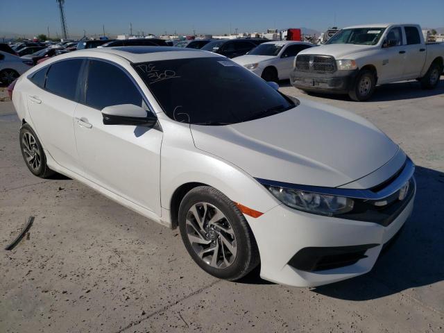 HONDA CIVIC EX 2018 with VIN 19XFC2F75JE038544 - Photo from auction
