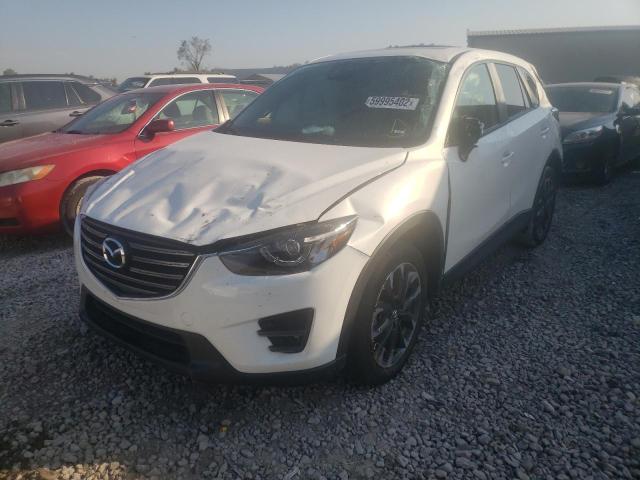 Photo 2 from auction – 2016 MAZDA CX-5 GT with VIN JM3KE2DYXG0735446