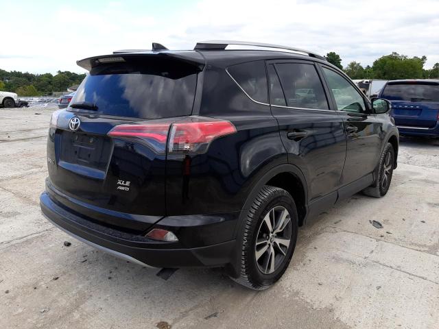 Photo 4 from auction – 2017 TOYOTA RAV4 XLE with VIN 2T3RFREV5HW633681