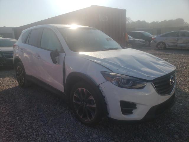 MAZDA CX-5 GT 2016 with VIN JM3KE2DYXG0735446 - Photo from auction
