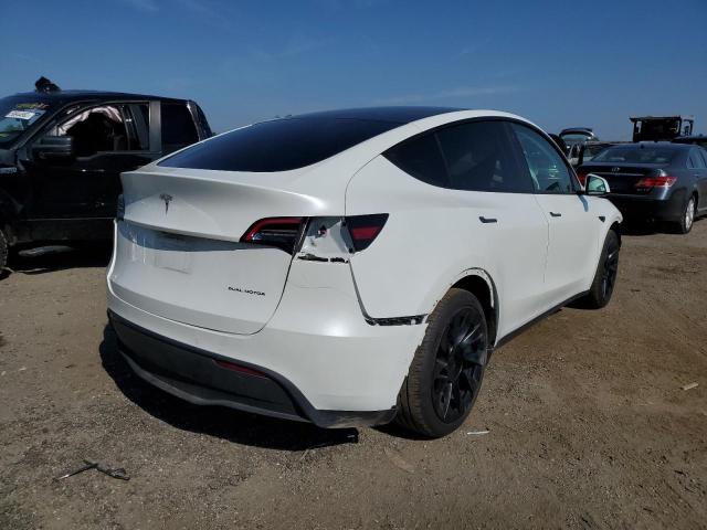 Photo 4 from auction – 2021 TESLA MODEL Y with VIN 5YJYGDEE3MF092612