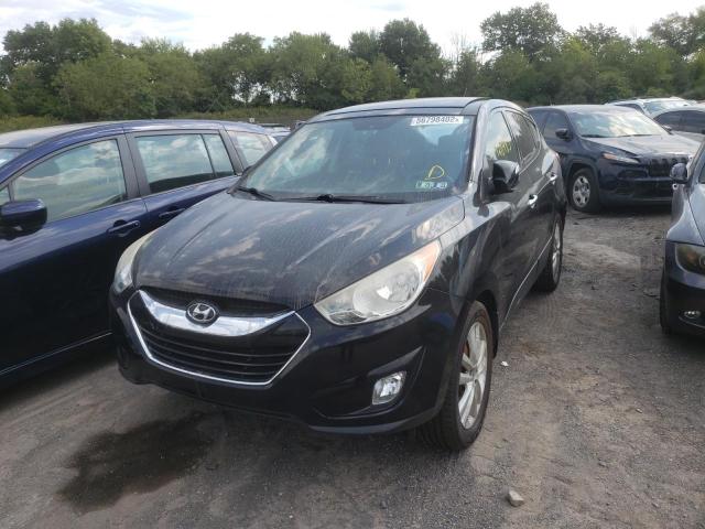 Photo 2 from auction – 2012 HYUNDAI TUCSON GLS with VIN KM8JUCAC9CU537848