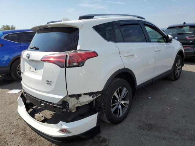 Photo 4 from auction – 2017 TOYOTA RAV4 XLE with VIN JTMRFREVXHJ705666