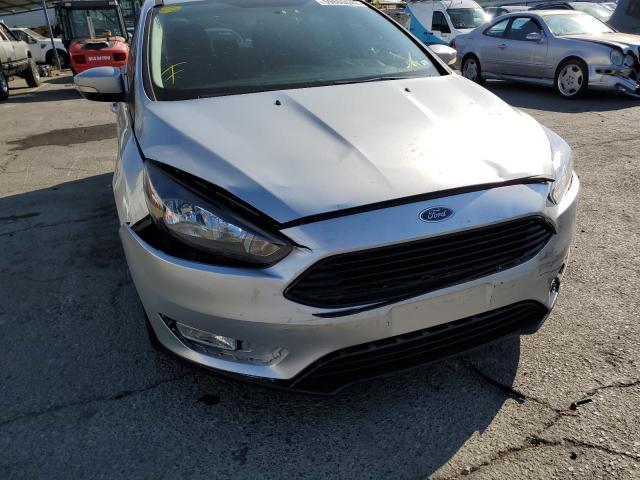 Photo 9 from auction – 2018 FORD FOCUS SE with VIN 1FADP3F21JL226013