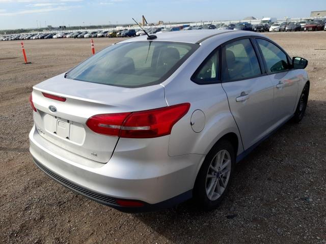 Photo 4 from auction – 2017 FORD FOCUS SE with VIN 1FADP3F21HL315090
