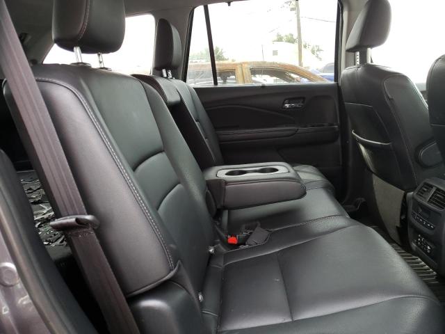 Photo 6 from auction – 2018 HONDA PILOT TOUR with VIN 5FNYF6H98JB026985
