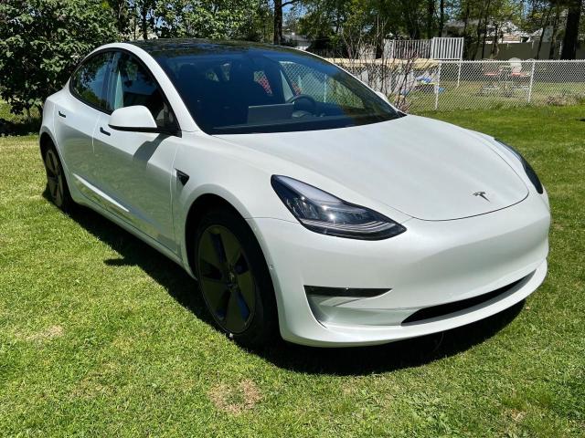 TESLA MODEL 3 2021 with VIN 5YJ3E1EA2MF854985 - Photo from auction