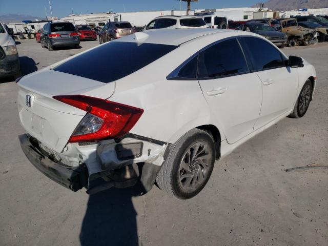Photo 4 from auction – 2018 HONDA CIVIC EX with VIN 19XFC2F75JE038544