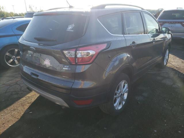 Photo 4 from auction – 2017 FORD ESCAPE SE with VIN 1FMCU9GD5HUD08070