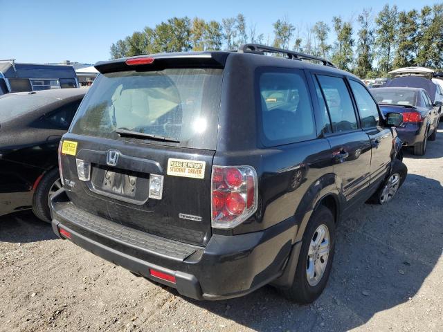 Photo 4 from auction – 2006 HONDA PILOT LX with VIN 2HKYF18116H522250