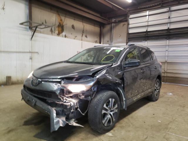 Photo 2 from auction – 2018 TOYOTA RAV4 LE with VIN JTMBFREV6JJ212929