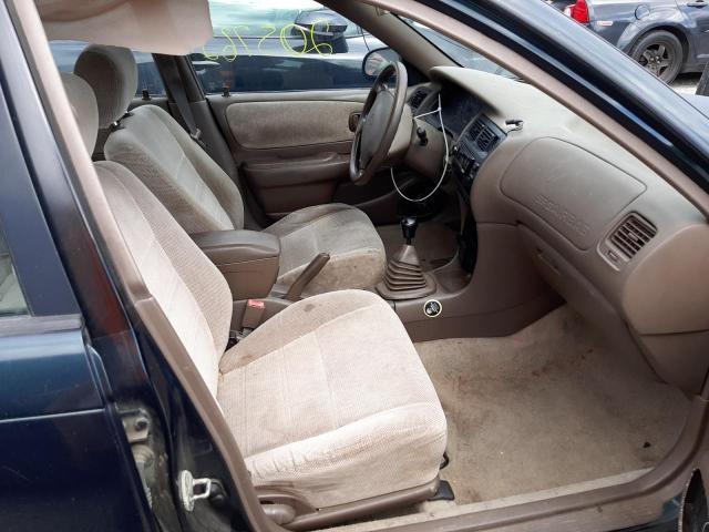 Photo 5 from auction – 1997 TOYOTA COROLLA DX with VIN 1NXBB02E6VZ595363