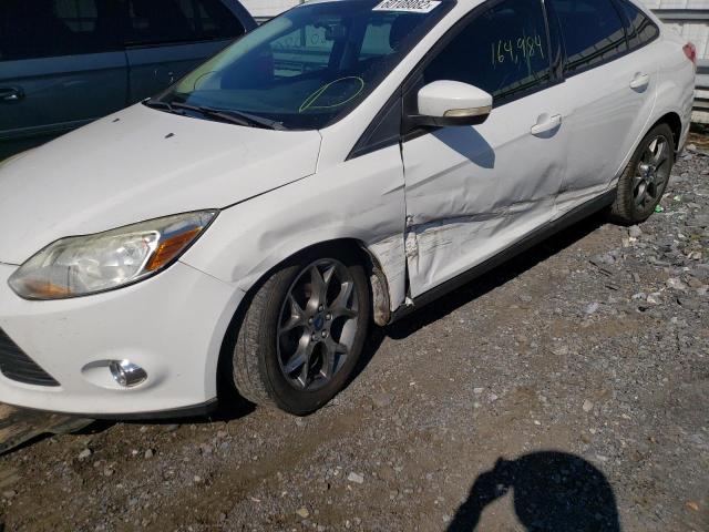 Photo 9 from auction – 2013 FORD FOCUS SE with VIN 1FADP3F29DL236860