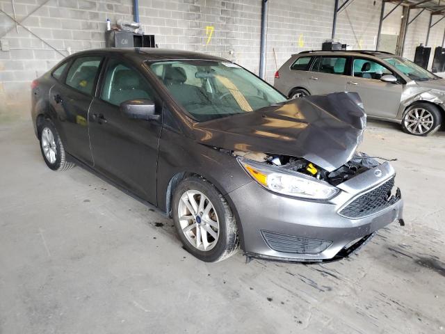 FORD FOCUS SE 2018 with VIN 1FADP3F21JL324085 - Photo from auction