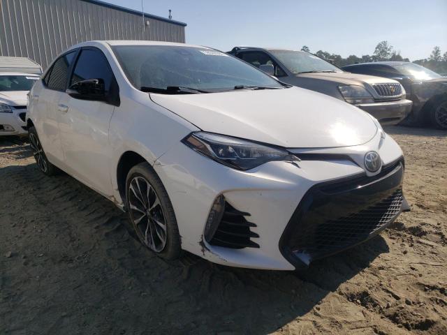 TOYOTA COROLLA L 2017 with VIN 5YFBURHE1HP654895 - Photo from auction